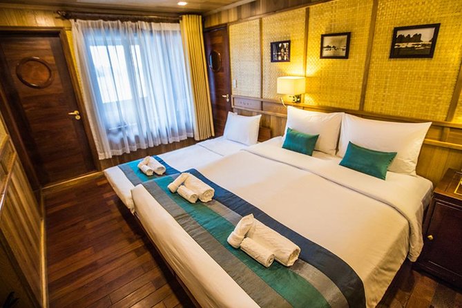 All inclusive Bhaya 2-Day Halong Bay Tour - Dinner, squid fishing, and the on-board rhythm of night one