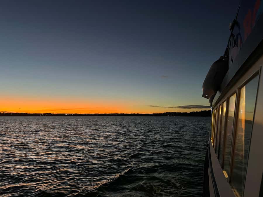 Auckland Sunset Harbour Cruise - The open deck breeze and photo time (so you don’t freeze or miss shots)
