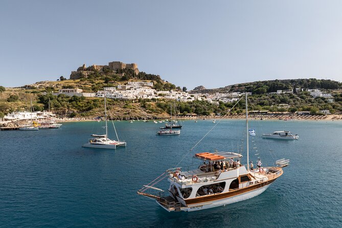 Bay to Bay Cruise in Lindos - Stop 1: Lindos Beach at Guns of Navarone Bay (30 minutes)
