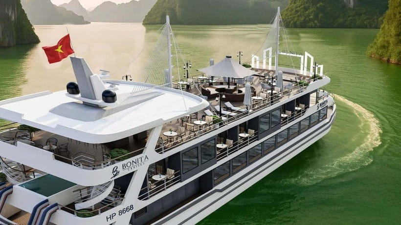 Cat Ba: Lan Ha Bay Cruise with Private Balcony & Small Group - Day 1 schedule: islets, kayaking, sunset, cooking, squid fishing