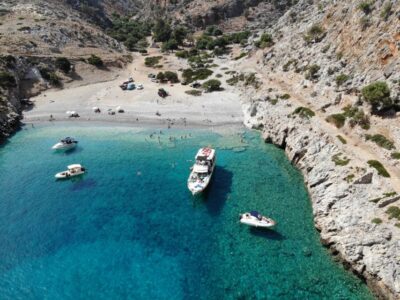 Chania: Menies Beach & Chironisia Bay Cruise with Snorkeling - Menies Beach: WWII Remains and Ancient Diktynna