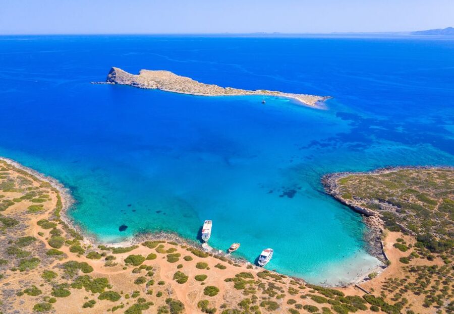 Crete: Mirabello Bay Cruise with Onboard Cocktail - Languages, Guide Style, and How to Get the Most From the Stops