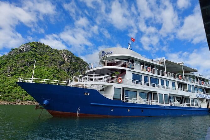 Emeraude Cruise 2 days 1 night Ha Long Bay Tour - Sunset and evening: squid fishing, movies, and deck drinks