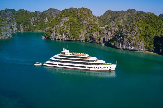 Emeraude Cruise 2 days 1 night Ha Long Bay Tour - Sunrise on the ship: tea, yoga options, and an early cave visit