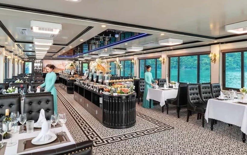 From Ha Long: Luxurious 6-Hour Halong Bay Cruise. - Luon Cave lagoon: kayak or bamboo boat (and yes, there’s an extra fee)