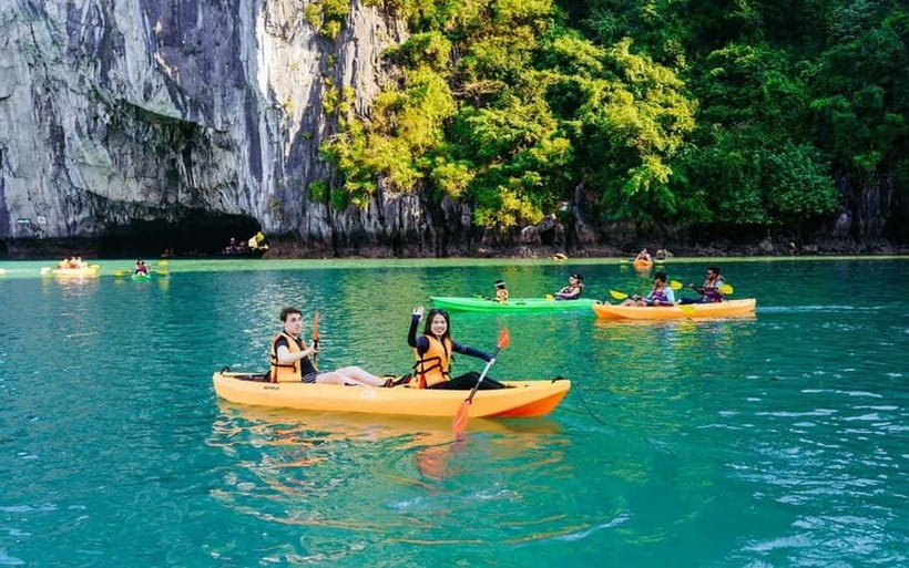 From Ha Long: Luxurious 6-Hour Halong Bay Cruise. - Sunset party on the upper deck: music, sun, and the slow cruise back