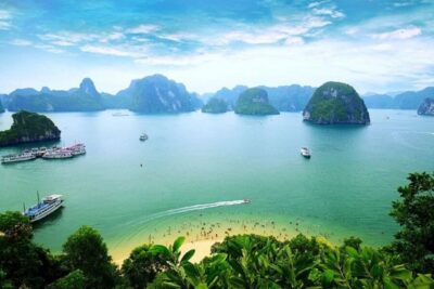 From Hanoi: 2-Day Ha Long Bay Tour with Ninh Binh and Cruise - Day 1 on Ha Long Bay: Sung Sot Cave, Titop Island, Luon kayaking, and a sunset party