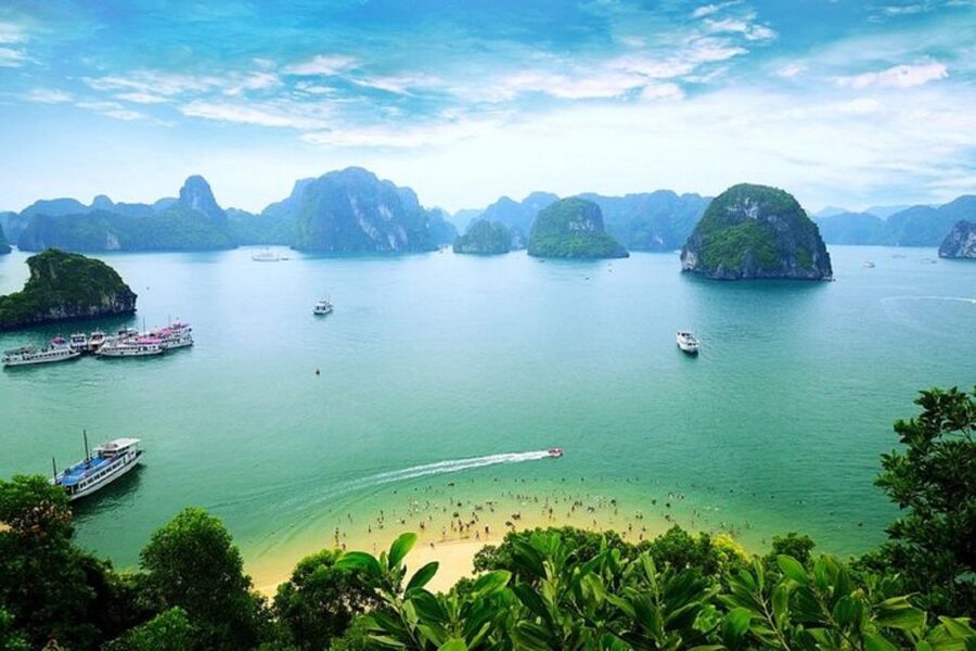 From Hanoi: 2-Day Ha Long Bay Tour with Ninh Binh and Cruise - Day 1 on Ha Long Bay: Sung Sot Cave, Titop Island, Luon kayaking, and a sunset party