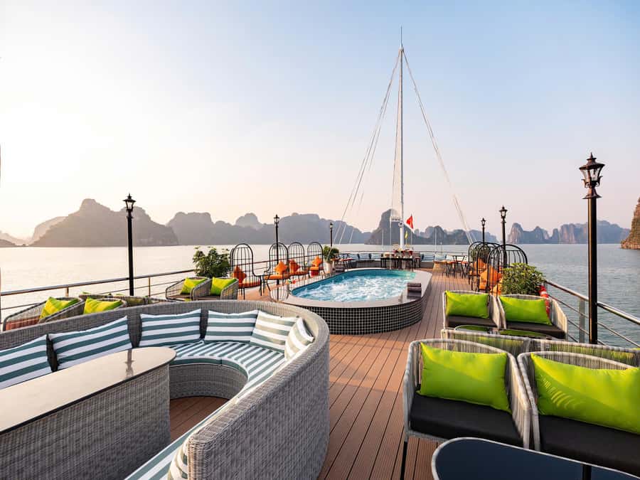 From Hanoi: 3-Day Ha Long and Lan Ha Bay Cruise with Meals - Day 1: Dark and Light Cave, kayaking or bamboo boats, and sunset time