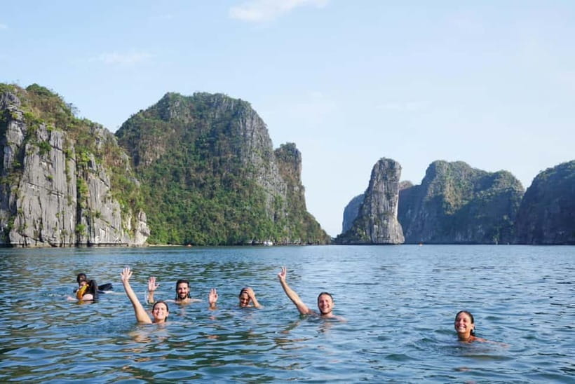 From Hanoi: Cat Ba Island and Lan Ha Bay Cruise Day Trip - Water activities in Lan Ha Bay: swimming, jumping, kayaking, and the top-deck slide