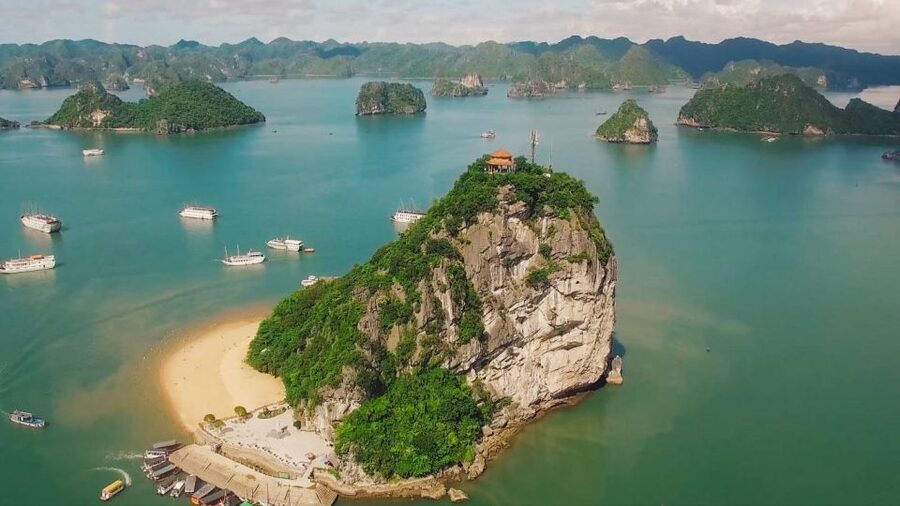 From Hanoi: Halong Bay Cruise 2 Days 1 Night With Transport - Day 1 Schedule: Titop Island, Kayaking, and a Sundeck Evening