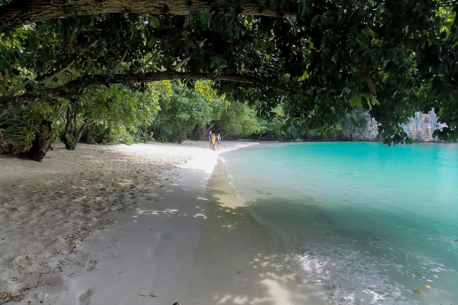 From Phuket: Full-Day Phang Nga Bay Cruise with Meals - Island caves and learning how families make a living
