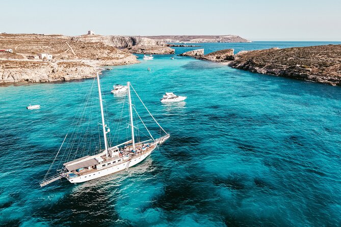 From Sliema: Three Bay Cruise with Lunch and Optional Transfers - St. Paul’s Bay or beneath Selmun: your first swim stop