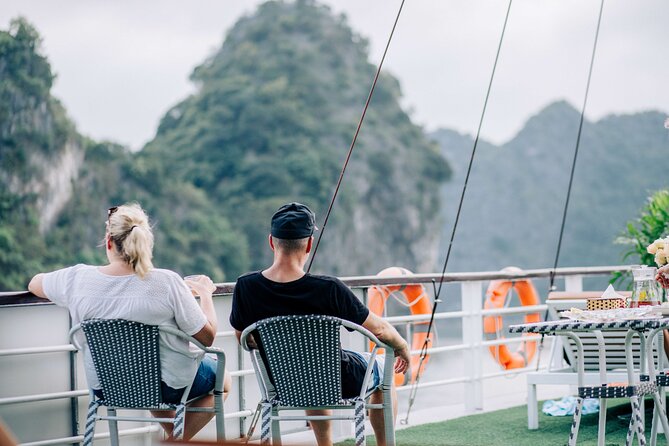Full-Day Halong Bay Cruise with Limousine Pickup - Hang Luon Cave: Kayaking (About 30 Minutes) or a Local Rowboat