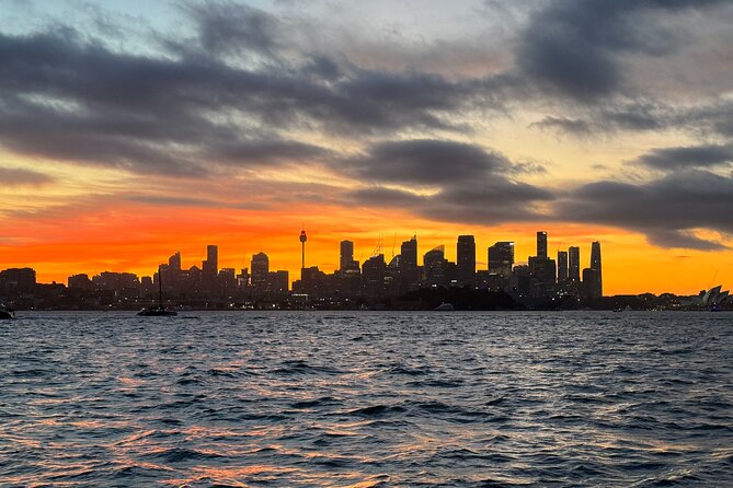 Golden Glow Sunset Sydney Harbour Cruise - Onboard setup: 360° views, calm boat size, and restrooms