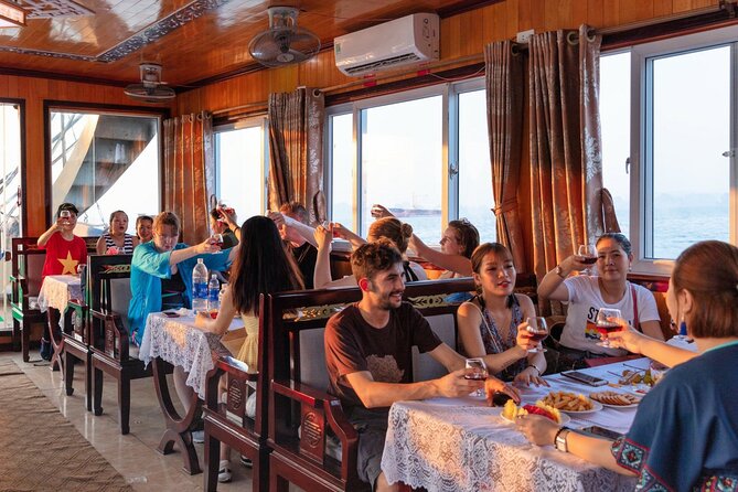 Ha Long Bay Cruise Day Tour with lunch, kayaking, surprise cave & titop island - Surprise Cave: cool air, huge chambers, and the crowd reality