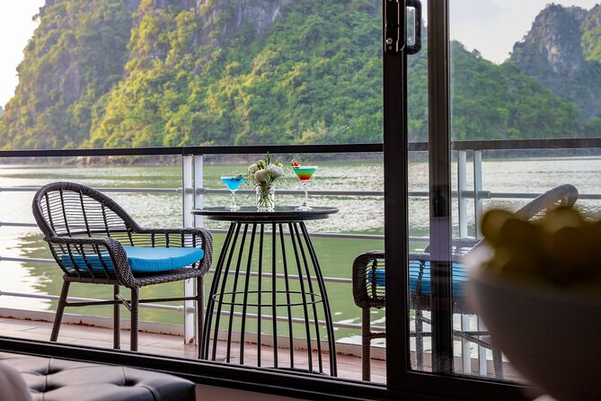 Halong Bay Cruise 2 days 1 night from Hanoi included transfer - Day 1: limestone sights, cave sculptures, and beach time