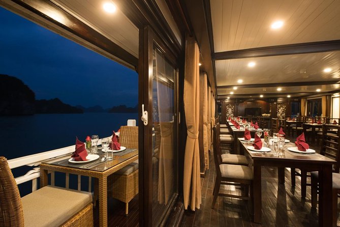 Halong Bay tour 2 days / 1 night on Stellar cruise {New 4 star Cruise}. - Day 2: Tai Chi, Luon Cave by kayak or bamboo boat, and spring-roll cooking