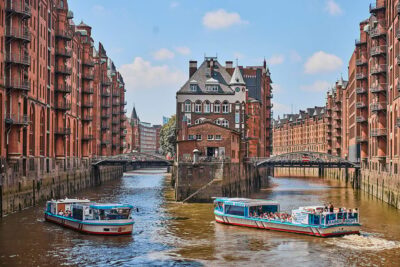 Hamburg: Harbor Cruise and Bus City Hop-On Hop-Off Tour - Harbor cruise through Speicherstadt and working ports