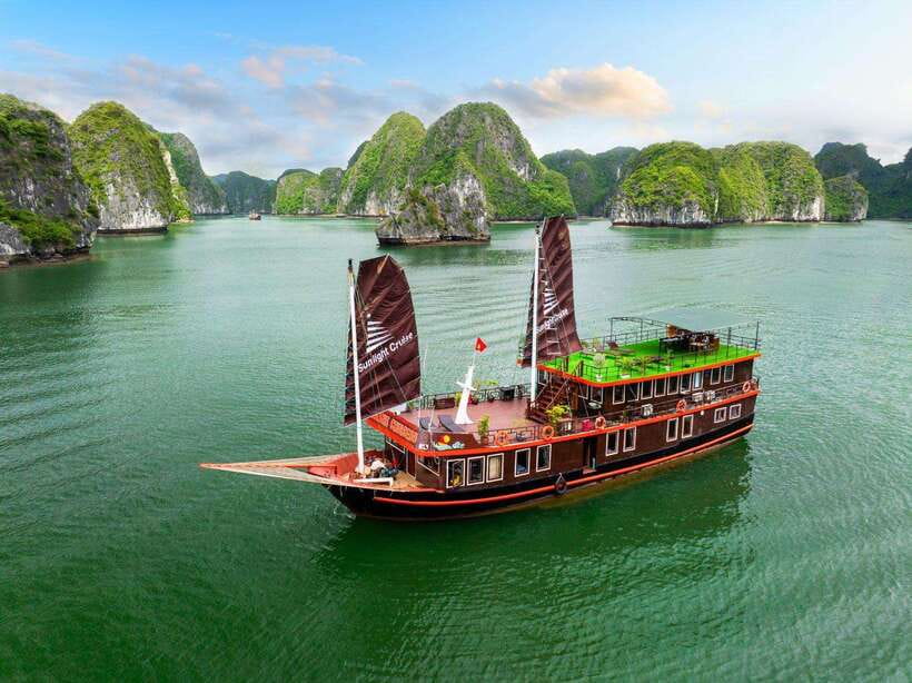 Hanoi: 2-Day Ha Long and Lan Ha Bay Cruise with Kayaking - Cooking class, night entertainment, and squid fishing on the cruise