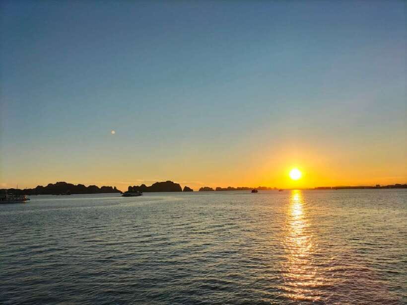 Hanoi: Full-Day Halong Bay Cruise with Swimming & Kayak Tour - Sunset party on the cruise: the easy way to end strong