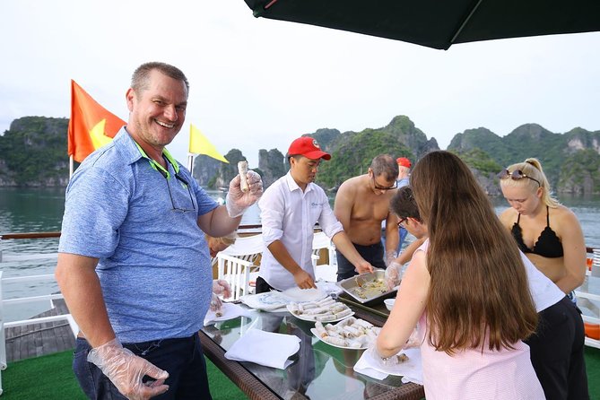 Overnight Bai Tu Long Bay and Ha Long Bay Cruise - Hanoi pickup, your sea-view cabin, and day-one momentum