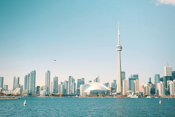 Toronto Premium Small Group Driving Tour with CN Tower - The Van Tour Between Stops: Dundas Square to Nathan Phillips Square
